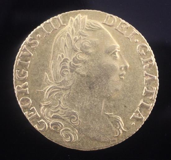 A George III 1774 gold guinea, VF or better.